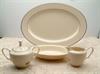 like new pre-owned, includes: 16'' oval platter, open vegetable bowl, creamer & sugar &lid.