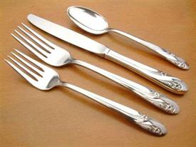 romance__int_plat__plated_flatware_by_holmes__and__edwards.jpg