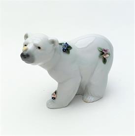,6354 'ATTENTIVE POLAR BEAR WITH FLOWERS' FIGURINE WITH ORIGINAL BOX. TINY CHIP ON BUTTERFLY'S WING TIP. 4" TALL, 4.75" LONG, 2.5" WIDE     