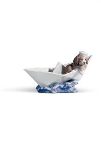 ,6642 'LITTLE STOWAWAY' DOG WITH SAILOR HAT IN PAPER BOAT FIGURINE. NO BOX. IN EXCELLENT PRE-OWNED CONDITION. 4" TALL,7" WIDE.              