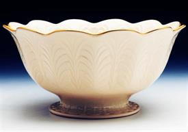 4.75" tall, 10" diameter footed bowl.                                                                                                       