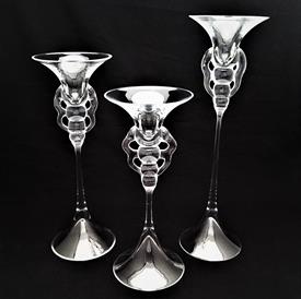 ,SET OF 3 MID CENTURY MODERNIST CANDLESTICKS. HAND BLOWN, CLEAR GLASS. STUDIO LINE COLLECTION. 13.75", 11.6", 10.2". SMALL CHIPS ON 11" BASE
