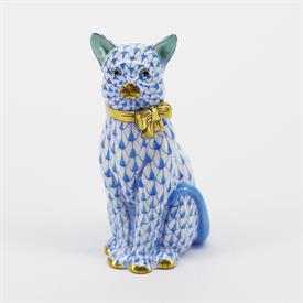 ,CAT SITTING WITH BOW FIGURINE #15319 IN BLUE FISHNET. 4.5" TALL, 2.5" LONG, 2.25" WIDE                                                     