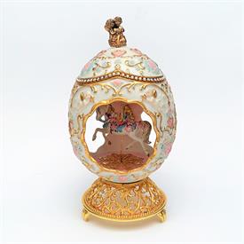 ,HOUSE OF FABERGE CAROUSEL EGG BY THE FRANKLIN MINT. WHITE WITH PINK HEARTS AND GOLD TRIM. 7.5" TALL                                        