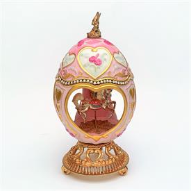,HOUSE OF FABERGE CAROUSEL MUSICAL EGG BY THE FRANKLIN MINT. PINK WITH GOLD HEARTS AND GOLD TRIM. 7.5" TALL                                 