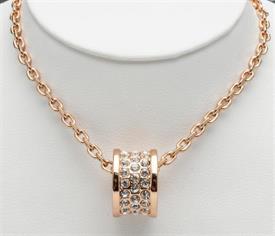 _18" GOLD PLATED BARREL ON CHAIN WITH CRYSTALS IN CENTER.                                                                                   
