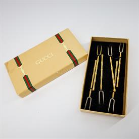 ,_SET OF 6 GUCCI BAMBOO STYLE COCKTAIL FORKS WITH GUCCI GIFT BOX. FORKS MEASURE 10.5 CM LONG. BOX SHOWS MINOR SIGNS OF WEAR.                