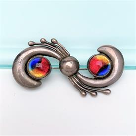 ,FUN MID CENTURY STERLING SILVER BROOCH WITH TWO TRI-COLORED GLASS CABOCHONS. SIGNED CV. 2.45" WIDE, 1.1" LONG, .45 OZT                     
