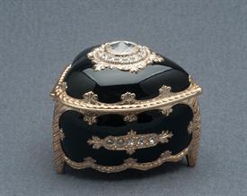 -,SMALL BLACK AND GOLD HEART SHAPED MUSIC BOX WITH SWAROVSKI CRYSTALS. PLAYS MY HEART WILL GO ON BY JAMES HORNER                            