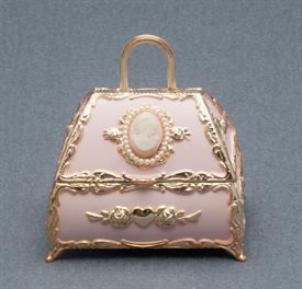 -PINK PURSE WITH CAMEO AND PEARLS MUSIC BOX. PLAYS MY HEART WILL GO ON BY JAMES HORNER                                                      