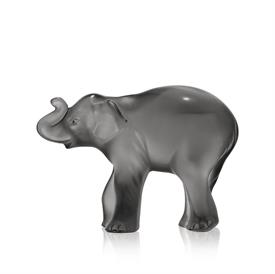 ,-TIMORA BABY ELEPHANT SCULPTURE. GRAY CRYSTAL, HANDCRAFTED IN FRANCE. 3.15" TALL X 4.29" LONG.                                             