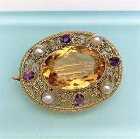 ,ANTIQUE 14K GOLD ITALIAN FILIGREE BROOCH WITH PEARLS, AMETHYSTS & CENTRAL CITRINE. 1.6" WIDE, 1.25" LONG, 14.2 GRAMS                       