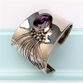 ,VINTAGE CARROL FELLEY (ANGLO) STERLING SILVER & AMETHYST CUFF BRACELET. 2.25" THICK TO 1.2" THICK. 2.38 OZT                                