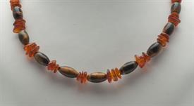 AMBER & TIGER'S EYE BEADED NECKLACE. NATURAL AMBER 'CHIP' BEADS. .25" X .5" CYLANDER TIGER'S EYE BEADS. ADJUSTABLE 17" TO 19" LONG          