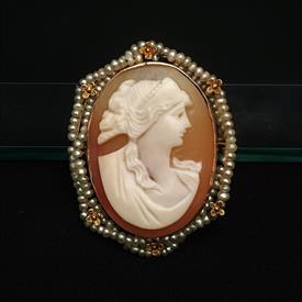 ,EDWARDIAN 10K GOLD & SHELL CAMEO BROOCH/PENDANT WITH SEED PEARL BORDER. 1.55" LONG, 1" WIDE. 6 GRAMS                                       