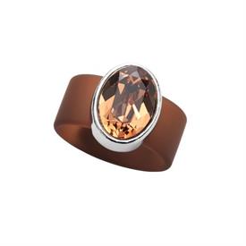 _,LARGE TOPAZ CRYSTAL ON BROWN RUBBER BAND RING. FITZ APPROX. SIZE 9. APPROX. 8 CARAT SWAROVSKI CRYSTAL                                     