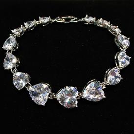 -,CLEAR GRADUATED HEART CZ BRACELET. 7" LONG                                                                                                