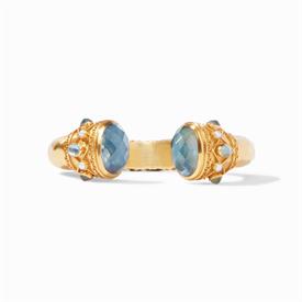 -,HINGE CUFF IN IRIDESCENT AZURE BLUE. GLASS GEMSTONE END CAPS ON A MOTHER OF PEARL DOUBLET W/ PEARL ACCENTS ON 24K GOLD PLATE CUFF. ONE SIZ