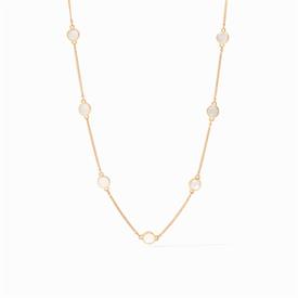 -VALENCIA MOTHER OF PEARL DELICATE STATION NECKLACE. 9 DELICATE MOTHER OF PEARL DISCS IN A 24K GOLD PLATED CHAIN. ADJUSTABLE 16.5" TO 17.5" 