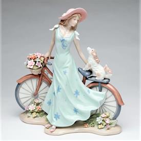 _,'RIDING BIKE WITH MY BEST FRIEND' GIRL & DOG FIGURINE. 10.5" LONG, 5" WIDE, 10.6" TALL                                                    