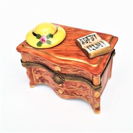,RETIRED DRESSER WITH HAT & BOOK LIMOGES TRINKET BOX. HAND PAINTED. 2.2" TALL, 2.5" LONG, 1.5" WIDE                                         