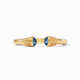 -,LUXE DEMI HINGE CUFF IN IRIDESCENT AZURE BLUE. GLASS GEMSTONE & CZ ACCENT END CAPS ON 24K GOLD PLATED LIGHTLY HAMMERED CUFF. ONE SIZE     
