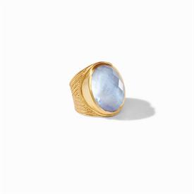 -,STATEMENT RING IN IRIDESCENT CHALCEDONY BLUE. GLASS GEMSTONE ATOP A MOTHER OF PEARL DOUBLET WITH 24K GOLD PLATED DETAILED SHANK. SIZE 7   