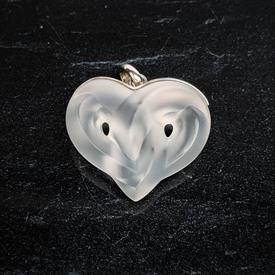 ,CLEAR & SILVER 'ENTWINED HEART' PENDANT. 1.25" LONG, 1.15" WIDE                                                                            