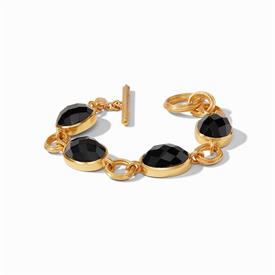 -,BARCELONA BRACELET IN OBSIDIAN BLACK. ROSE CUT GLASS GEMS NESTLED BETWEEN 24K GOLD PLATED LINKS WITH A TOGGLE CLOSURE. 8" LONG            