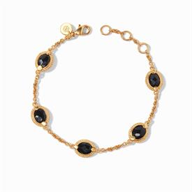 -,OBSIDIAN BLACK DELICATE BRACELET. FACETED OVAL GLASS GEMSTONES IN A 24K GOLD PLATED CHEVRON SURROUND WITH A SLENDER CHAIN. ADJUSTABLE     