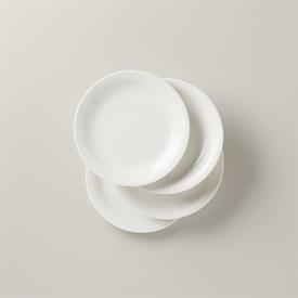 -WHITE SET OF 4 ACCENT PLATES. 9" WIDE. DISHWASHER & MICROWAVE SAFE. BREAKAGE REPLACEMENT AVAILABLE. MSRP $72.00                            