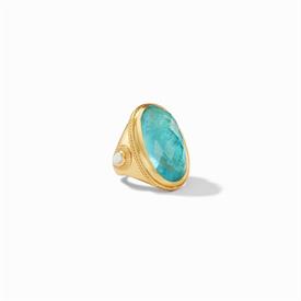 -,STATEMENT RING IN IRIDESCENT BAHAMIAN BLUE. RADIANT OVAL GLASS GEM WITH PEAR SHAPED PEARL ACCENTS IN 24K GOLD PLATED SHANK. SIZE 7        