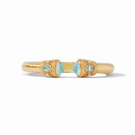 -,MONACO DEMI CUFF IN IRIDESCENT BAHAMIAN BLUE. 24K GOLD PLATED HINGED CUFF WITH GLASS GEMSTONE & FRESHWATER PEARL ACCENTS. ONE SIZE.       