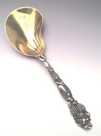 ,KIDNEY SHAPED BERRY SERVING SPOON WITH GOLD WASHED BOWL IN THE BLACKBERRY PATTERN. NO MONOGRAMS OR DAMAGE                                  
