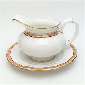 ,RED GRAVY BOAT WITH UNDERPLATE. 4" TALL TO LIP. UNDERPLATE IS 7.5" WIDE                                                                    
