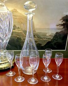 ,SAINT-REMY DECANTER AND SIX CORDIAL GLASSES. STOPPER IS NOT ORIGINAL, BUT IS AN EXCELLENT FIT. DECANTER, 13.5" TALL. GLASSES, 5.6" TALL.   